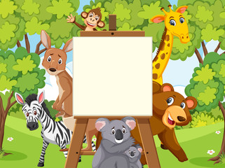 Obraz na płótnie Canvas Sign template with wild animals in the forest background