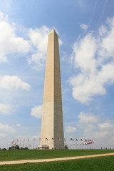 Obraz premium Washington Monument and american flag at Washington DC 