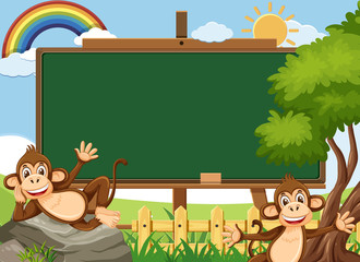 Blackboard template design with two happy monkeys in the park