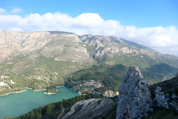 View of the Guadalest reservoir lake with azure water from the castle, Castell de Guadalest, Spain