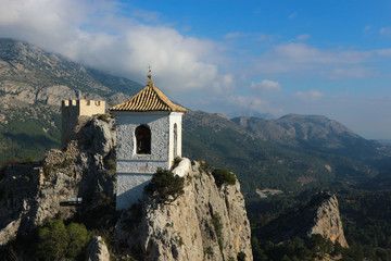 Fototapeta na wymiar Old bell tower on the top of the rock, Castell de Guadalest, Spain