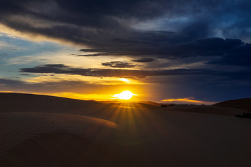 dramatic sunset in desert