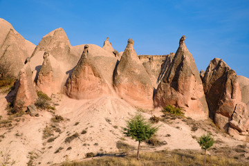 Fototapeta premium Devrent Valley / Imaginary Valley, a valley full of unique rock formations in Cappadocia, Turkey