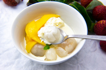 Garnished lychee and vanilla ice cream