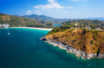 Obraz premium Aerial view of Nai Harn beach during high season, Phuket island, Thailand