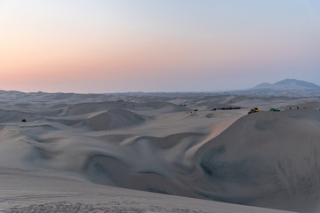 Beautiful view of Huacachina desert during golden hour Peru South America