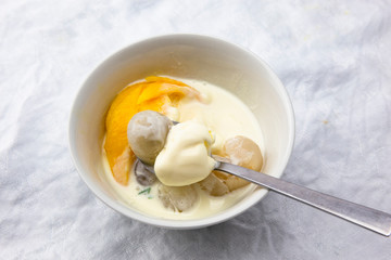 Garnished lychee and vanilla ice cream
