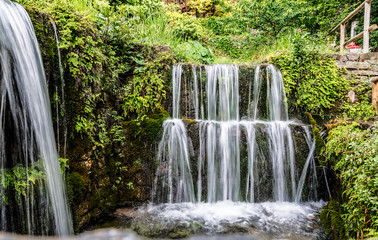 A small picturesque waterfall in the village of Argirupoli on the island of Crete, Greece