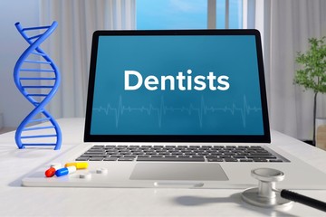 Dentists – Medicine/health. Computer in the office with term on the screen. Science/healthcare