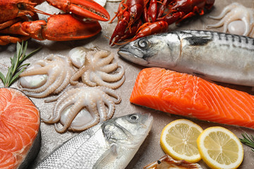 Fresh fish and seafood on marble table