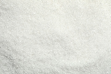 Fototapeta premium Pile of granulated sugar as background, top view