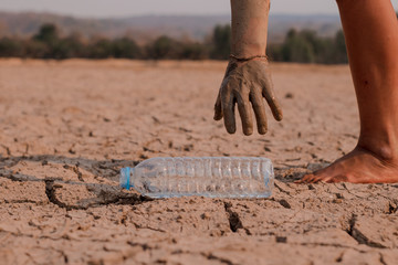 on dry ground, concept hope and drought