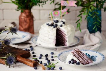 Fototapeta na wymiar Almond crepe cake with blueberry cream .selective focus.