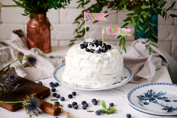 Almond crepe cake with blueberry cream .selective focus.