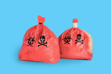 Two Red garbage bag for infectious waste isolated on white background.