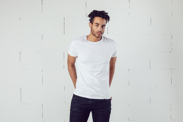 African american man wearing white blank t-shirt. Mock-up.