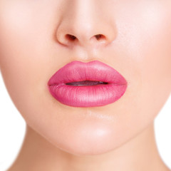 Beautiful natural lips with pink color lipstick.