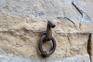 The ancient horse hitching ring on the wall  in the upper town of Bergamo, Italy