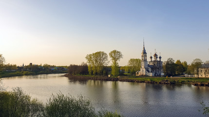 Fototapeta na wymiar Vologda. Beautiful spring day on the river Bank. Church Of The Meeting Of The Lord. 18th century.