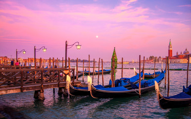 Plakat Gondolas in Venice Grand Canal at sunset, Italy. Architecture and landmarks of Venice.