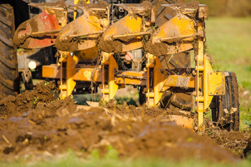 farmer plowing plan his fields close up