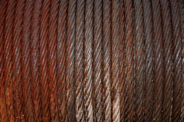 Rusty steel rope coil texture. Industrial grunge background for wall paper