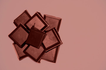 Chocolate on a dark background top view