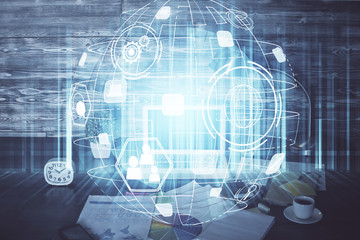 Computer on desktop with social network hologram. Multi exposure. Concept of international people connections.