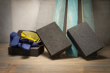 Renovation concept with abrasive sponges and plank