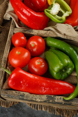Seasonal vegetables in a rustic tray. Top view.