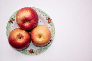 Apples on a light background, healthy nutrition.