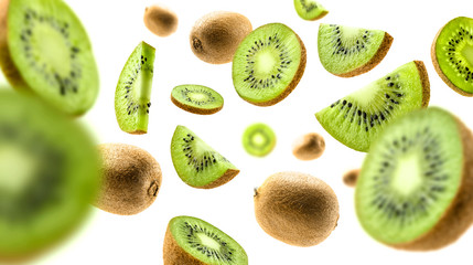 Kiwi fruit levitating on a white background - obrazy, fototapety, plakaty