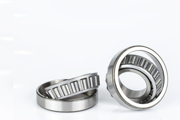 Close-up bearings spare part of mechanical on the white background..