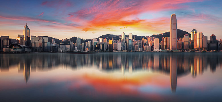 Hong Kong at sunrise with reflection, Financial downtow with skyscrapers © TTstudio