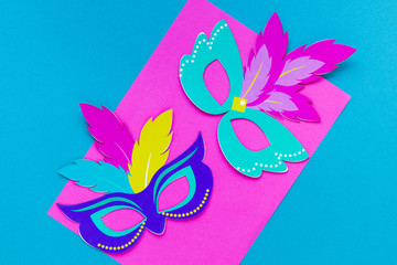 Colorful masks for carnival. Top view. Blue and pink.