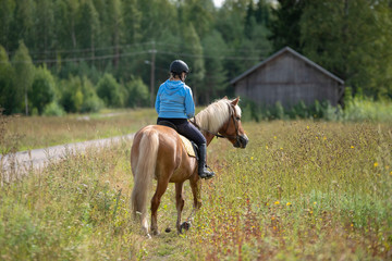 Woman horseback riding 