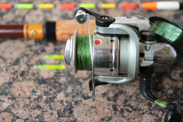  spinning with a reel with a wobbler and a float. Preparing for spring fishing.