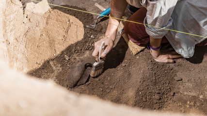 Archaeology - Archeologist Revealing Old Ceramic Object