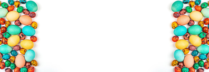 Stylish background with colorful quail, easter eggs with copy space for text isolated on white background. Flat lay, top view, mockup, overhead, template