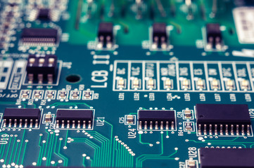 Close-up microchips, soldered components, electronic devices