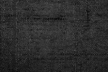 Black linen fabric texture or background.