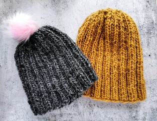 knitted winter hats on a white background