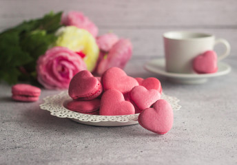Macaroons. Delicious french dessert. Macaroons are made in the shape of a heart. Romantic composition. Great for Valentine's day or romantic design.