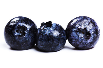 a handful of blueberries close-up isolated on white background