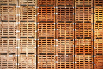 stack of many wooden pallets