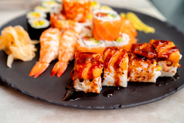 Rolls with salmon, shrimp and caviar