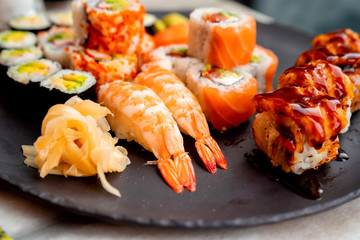 Rolls with salmon, shrimp and caviar