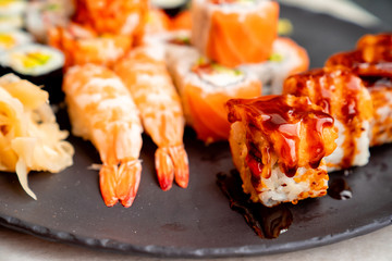Rolls with salmon, shrimp and caviar