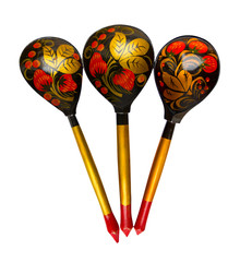 Wooden spoons with Khokhloma ornament isolated on a white background.
