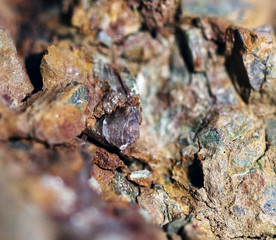 Stone with different texture and violet quartz